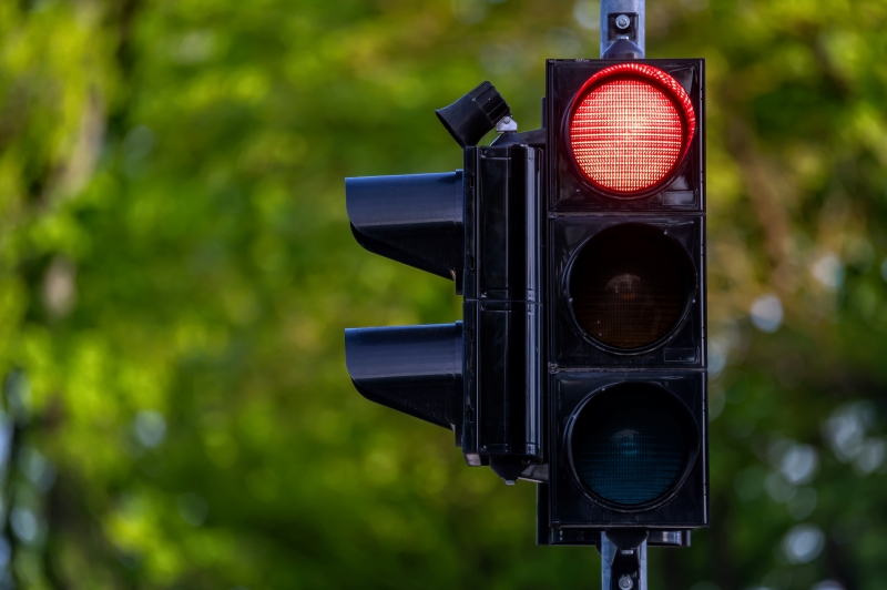A traffic light showing a red light signal