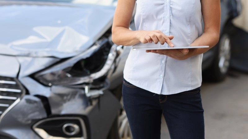 Registration of damage to car after accident. Car insurance and cash compensation concept