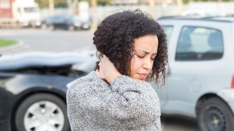 Injured woman feeling bad after having a car crash