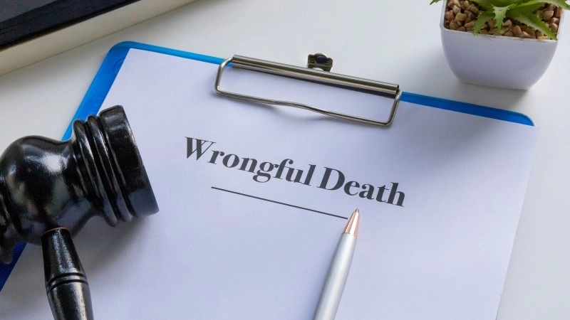 A professional and somber image of a wrongful death document in a clipboard,