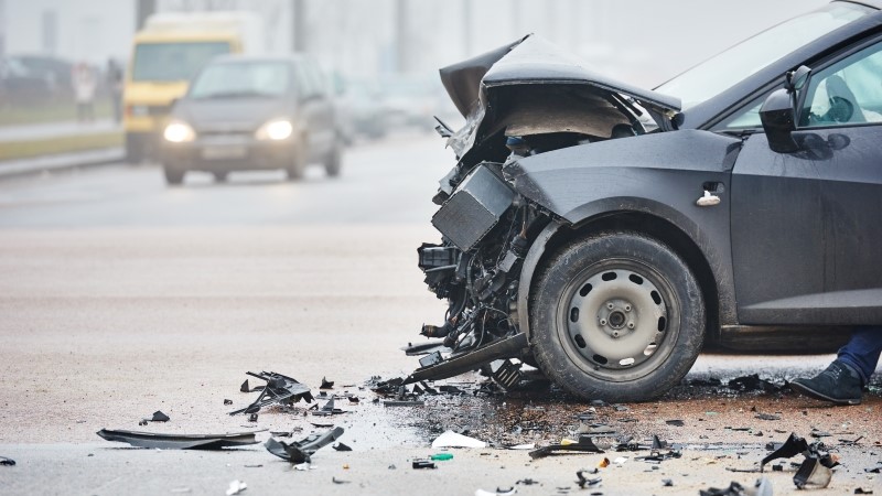 car crash accident on street, damaged automobiles after collision in city
