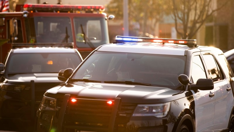 Police, fire, and paramedic units respond to the scene of an emergency.