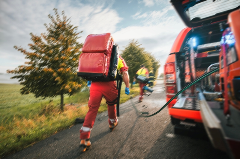 Paramedic and doctor of emergency medical medical service in blurred motion.