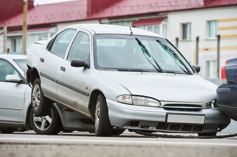 car collision accident on street. Three cars crashed in front