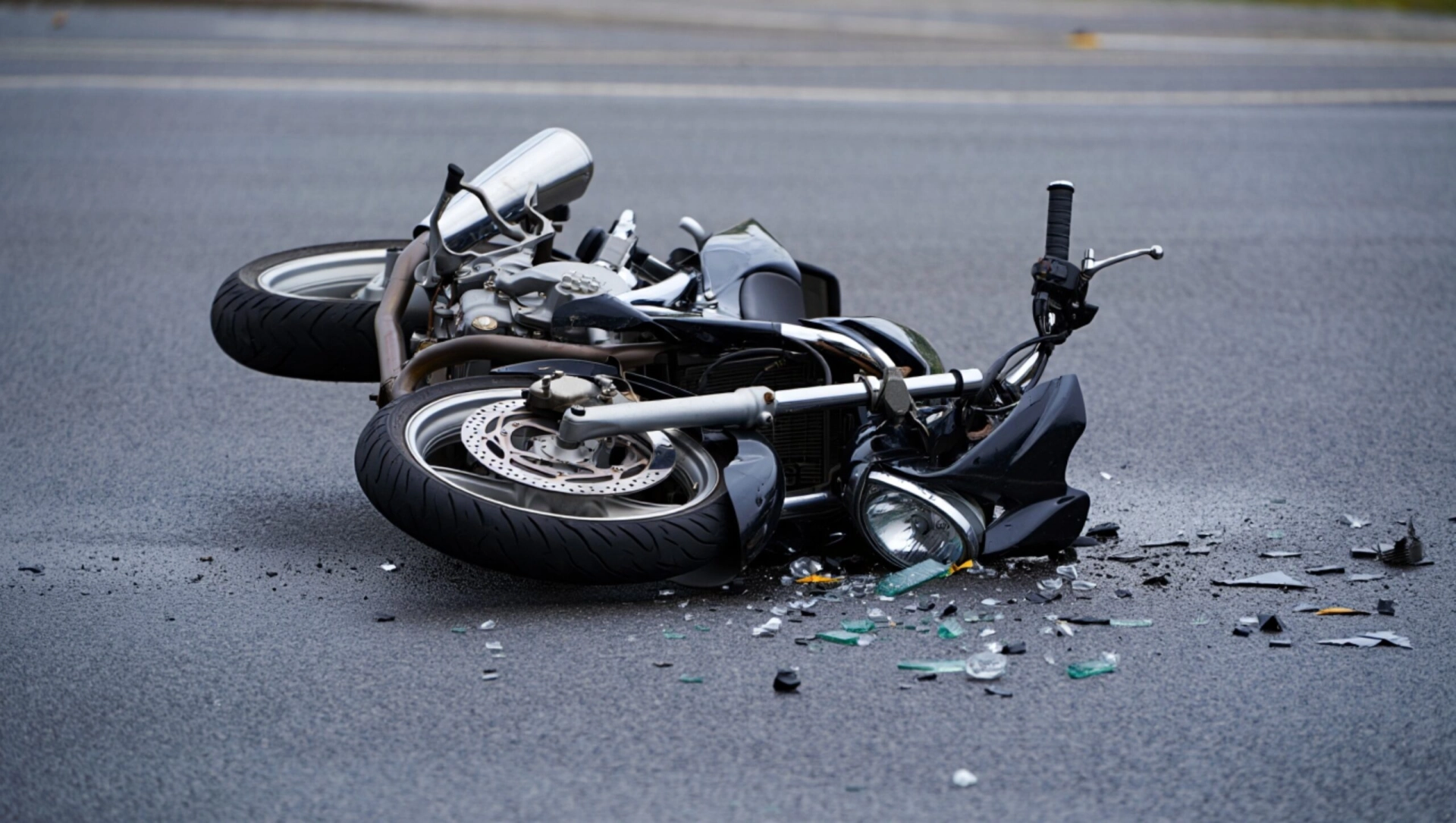 A,Dramatic,Motorcycle,Accident,Scene,,Showcasing,A,Fallen,Bike,Amidst