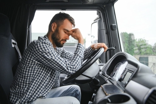 Tired Truck Driver in Cab Rockville Maryland